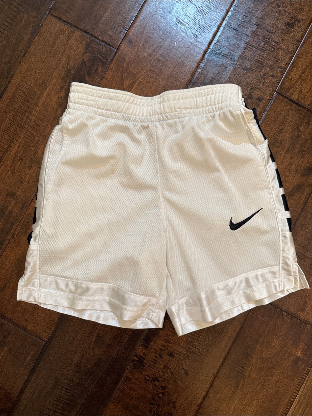 Nike White Kids Mesh Shorts with Black Swoosh